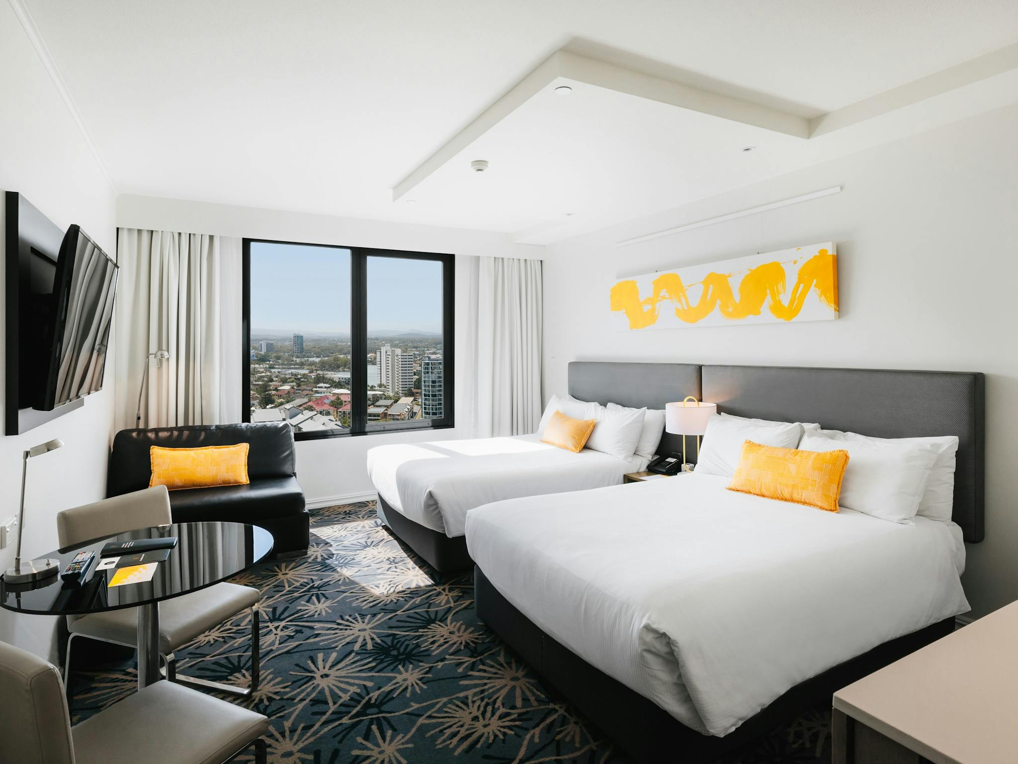 Superior twin beds with river and hinterland views